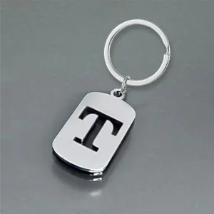 Premium silver stainless steel keychain featuring a minimalist hollow-out letter T design