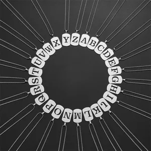 Full set of 26 stainless steel alphabet dog tag necklaces arranged in a circle
