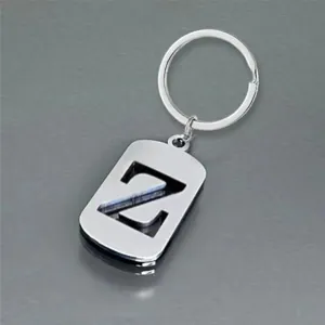 Detailed macro view of a stainless steel keychain with a stylish cut-out letter Z pendant