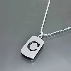 Polished stainless steel necklace with a hollowed letter C tag pendant on a silver box chain
