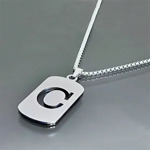 Modern silver stainless steel box chain necklace featuring a hollow letter C pendant