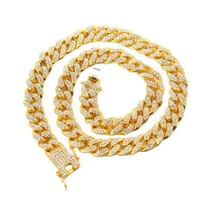 Iced out gold Cuban link necklace heavily encrusted with premium sparkling rhinestones