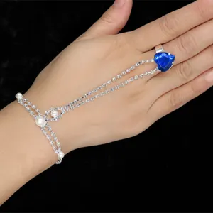 Bracelet bague élégant en strass argenté avec pierre de cœur bleue et des perles