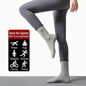 Professional anti-slip mid-calf yoga socks for women featuring bow embroidery for fitness