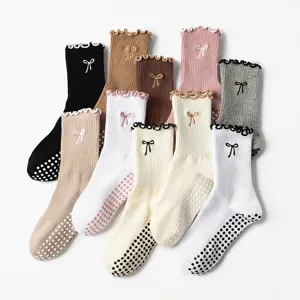 Professional non-slip crew yoga socks for women with cute ruffle top and bow embroidery detail