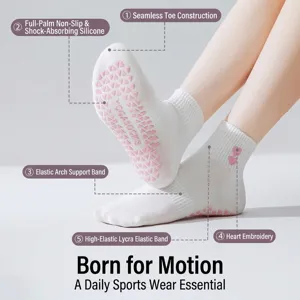 Calze da yoga antiscivolo professionali con ricamo a cuore e punti di presa in silicone