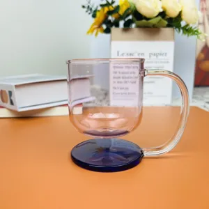 Detailed side view of a creative floating pink glass coffee mug with blue base and handle