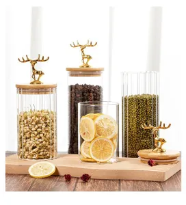 Lot de bocaux en verre rayé nordique avec couvercles élan dorés et joints en bois bambou