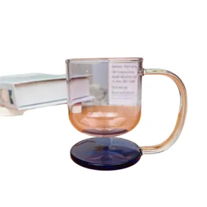 Colorful suspended borosilicate glass coffee mug with handle and triple-tone design