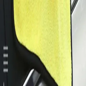 Close-up macro detail of yellow thickened microfiber coral fleece car wash towel