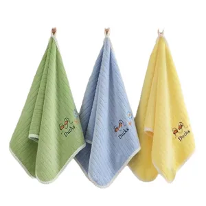 Set of three cute soft hanging hand towels with duck embroidery in green, blue, yellow.