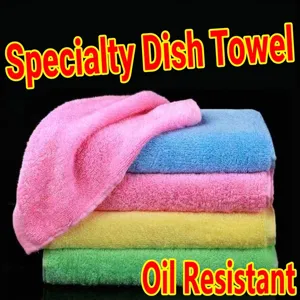 Stack of colorful absorbent wood fiber dishcloths for kitchen cleaning