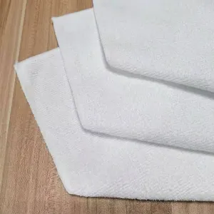 Close-up view of the white lint-free microfiber square towel for commercial kitchen use