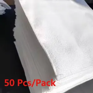 Stack of 50 white lint-free microfiber cleaning cloths for bakery and kitchen use
