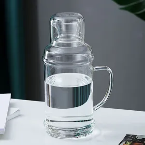 Large 2L capacity transparent glass cold water jug featuring a vintage style and cup lid