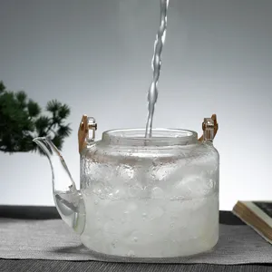 Teiera in vetro martellato resistente al calore con un manico naturale in bambù
