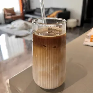Elegant minimalist ribbed high borosilicate glass coffee cup with glass straw for home use