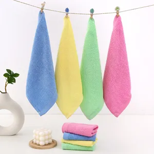 Set of absorbent wood fiber dishcloths in four bright colors for kitchen cleaning.