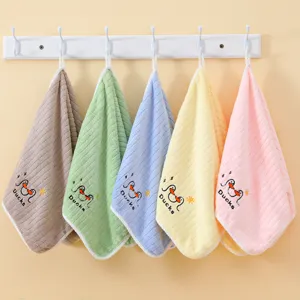 Soft coral fleece hand towels with cute cartoon duck embroidery in multiple colors.