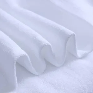 Premium soft white pure cotton hotel towel with highly absorbent terry texture