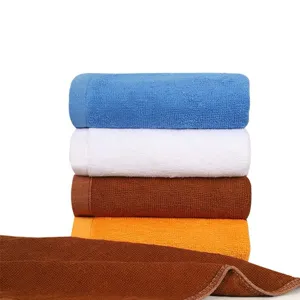 Detailed view of colorful soft cotton square towels showing texture and colors