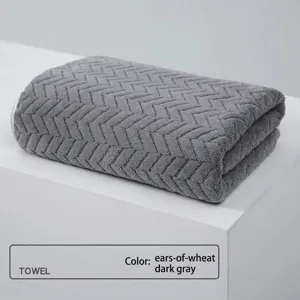 Highly absorbent coral fleece bath towel with wheat ear pattern in dark grey finish