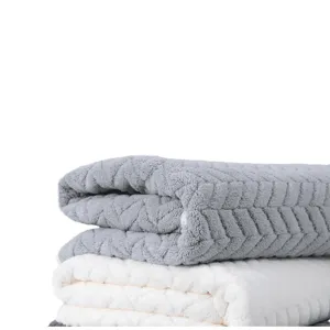 Soft coral fleece bath towel with decorative wheat ear and diamond pattern