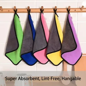 Detailed view of thick absorbent microfiber kitchen towels hanging on a rack