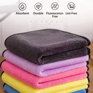 Close-up view of thick microfiber cleaning cloths stacked in vibrant multi-colors
