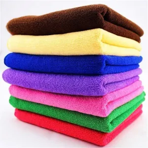 Stacked colorful microfiber cleaning towels showing various vibrant color options.