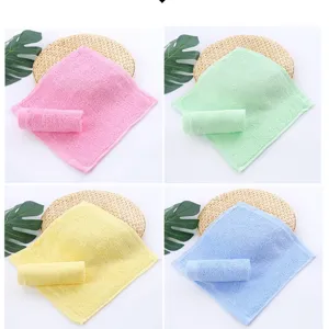 Four-color wood fiber kitchen cleaning cloths in pink, green, yellow, and blue