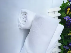 Detailed view of white lint-free microfiber cloth for industrial cleaning