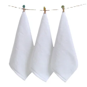 Soft white pure cotton square washcloths 30x30cm set hanging on a clothesline display