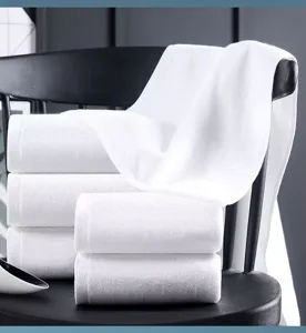 High-quality premium thick white hotel bath towel made of 100% pure soft cotton for spa and home