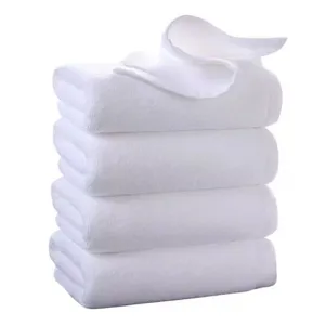 Luxury white thickened pure cotton hotel bath towels stack for soft absorbent use