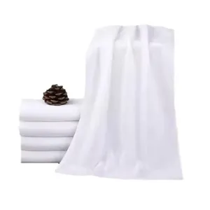 Soft and absorbent pure white cotton towels set for professional hotel and salon use