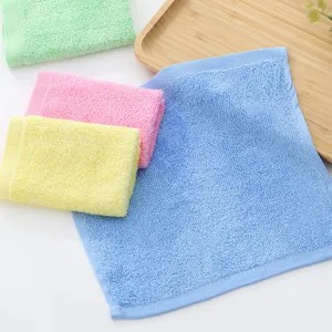 Detailed view of colorful 30x30cm wood fiber dishcloths with soft terry texture