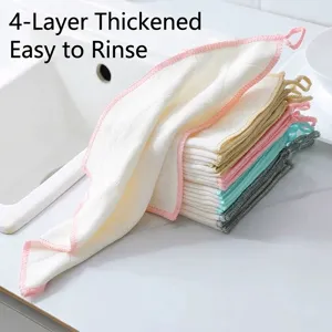 Stack of white thickened wood fiber dishcloths with colorful hanging loops
