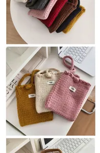 Detailed macro view of multi-colored handmade knitted mini crossbody phone bags