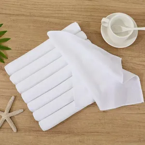 Detailed texture of thick white absorbent cotton hand towels for hotel and restaurant use