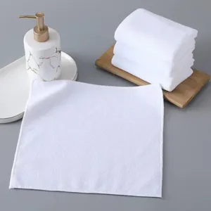 Soft white microfiber square face towels displayed with wooden board and soap dispenser