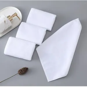 Premium set of four soft white microfiber square hand towels for hotel and daily use