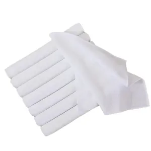 Set of professional white disposable thickened square towels for hotel and restaurant use.