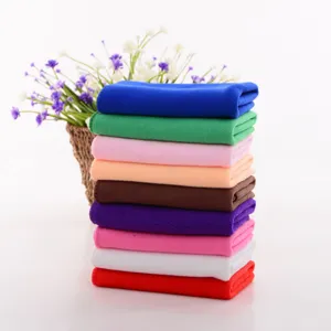 A neat stack of colorful thin microfiber nano towels for car cleaning and home use
