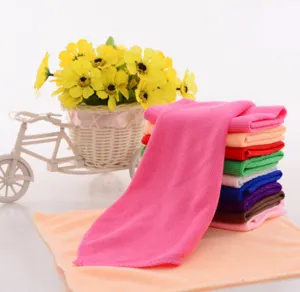 Close-up of a stack of soft multi-color microfiber towels for versatile cleaning use