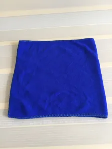 Close-up of a blue soft absorbent microfiber cleaning towel showing its fine fabric texture.