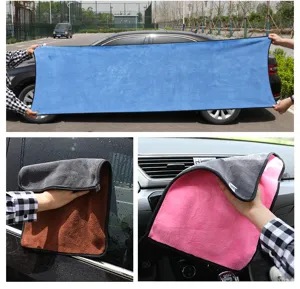 Detailed views of large absorbent microfiber towels cleaning car exterior and interior