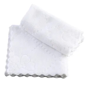Soft absorbent white dental disposable square towel with scalloped edges