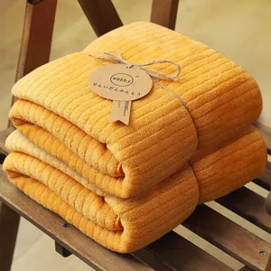 Large soft absorbent orange coral fleece bath towel with vertical stripes 80x150cm