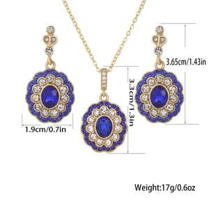 Detailed view of the vintage gold-tone sapphire blue jewelry set with measurements